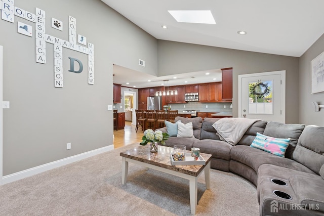 3223 Banta Rd, South Plainfield, NJ 07080 - living area featuring recessed lighting, light colored carpet, a skylight, healthy amount of natural light, and baseboards