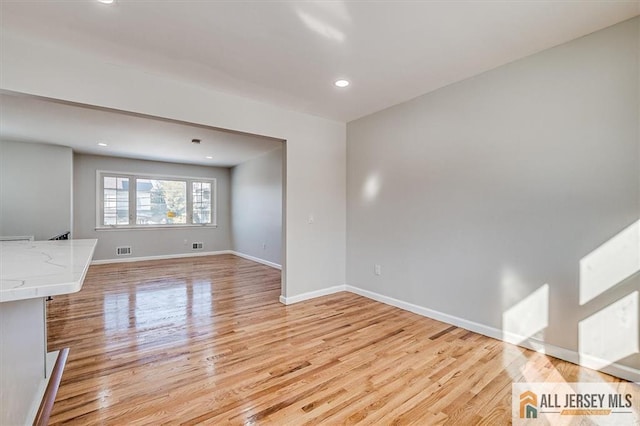 40 Brown Ave, Iselin, NJ 08830 - unfurnished living room with light wood-style flooring and recessed lighting