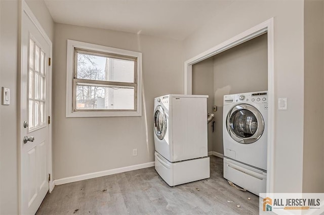 40 Brown Ave, Iselin, NJ 08830 - washroom featuring separate washer and dryer and wood finished floors