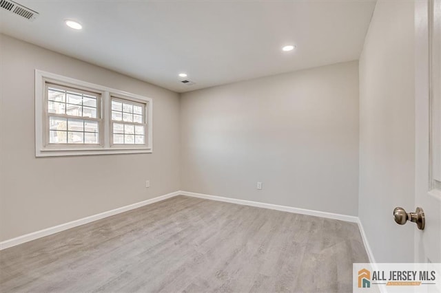 40 Brown Ave, Iselin, NJ 08830 - empty room featuring wood finished floors and recessed lighting