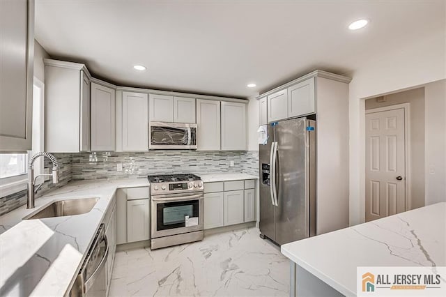 40 Brown Ave, Iselin, NJ 08830 - kitchen with stainless steel appliances, gray cabinets, backsplash, and recessed lighting