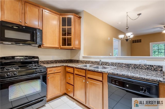 1410 Colts Cir, Lawrence, NJ 08648 - kitchen with black appliances, light tile patterned flooring, dark stone countertops, glass insert cabinets, and pendant lighting