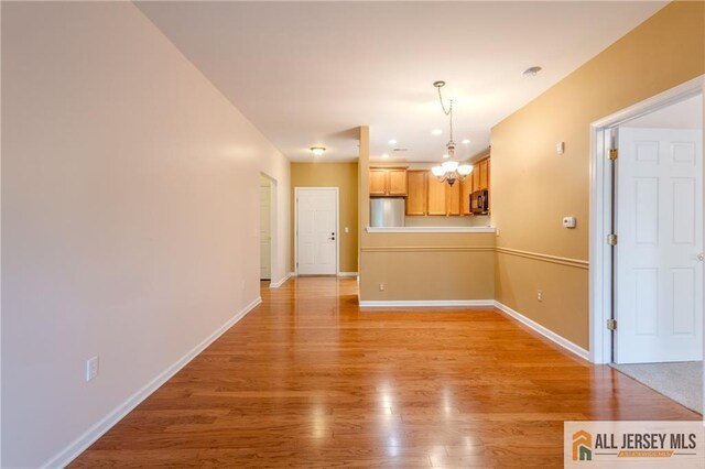 1410 Colts Cir, Lawrence, NJ 08648 - unfurnished living room featuring light wood-style flooring and recessed lighting