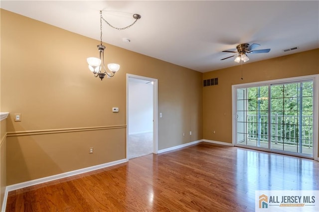1410 Colts Cir, Lawrence, NJ 08648 - unfurnished room with a ceiling fan, wood finished floors, and a chandelier
