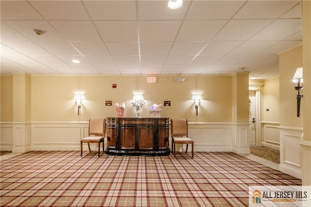 1410 Colts Cir, Lawrence, NJ 08648 - sitting room featuring carpet floors, a decorative wall, wainscoting, and a paneled ceiling