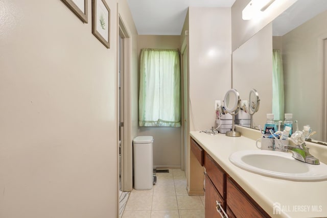 bathroom featuring vanity and tile patterned flooring