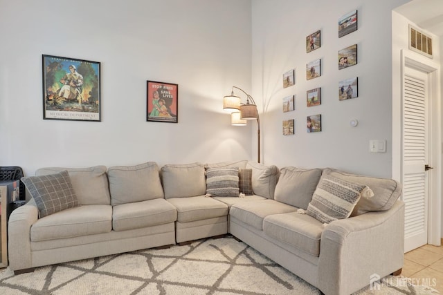 living area with light tile patterned floors