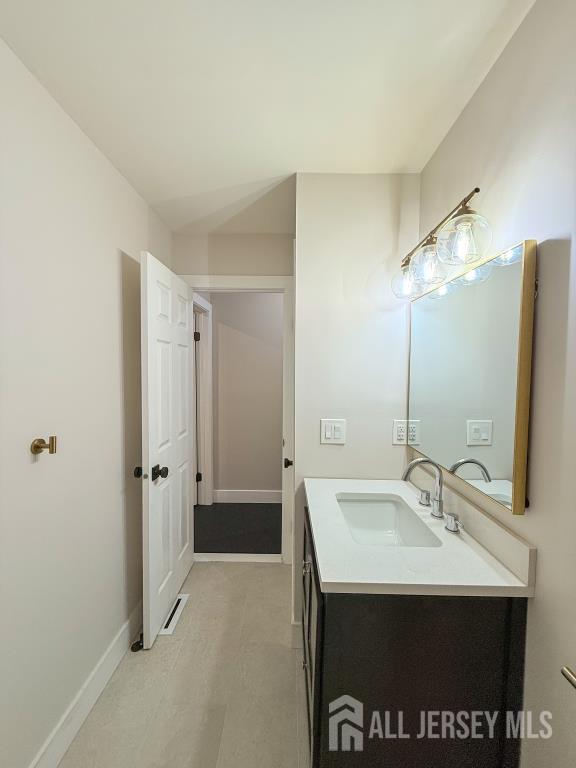 813 Darlington Dr, Old Bridge, NJ 08857 - bathroom featuring vanity and baseboards