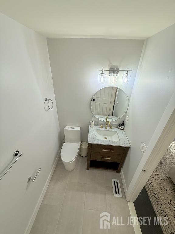 813 Darlington Dr, Old Bridge, NJ 08857 - half bath with vanity and tile patterned floors