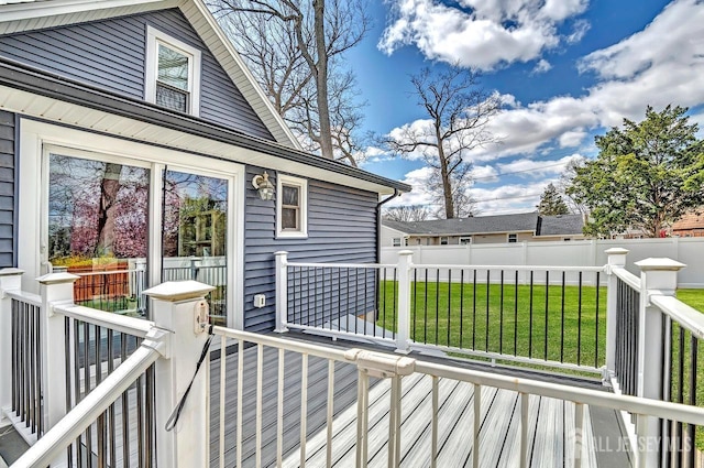 deck featuring a yard