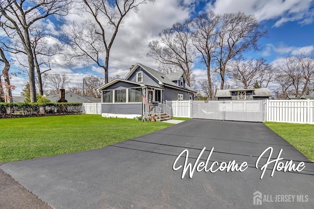 1276 S 11th St S, South Plainfield, NJ 07080 - view of front of house featuring a gate, a chimney, and a sunroom