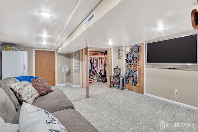 living room with carpet floors and baseboards