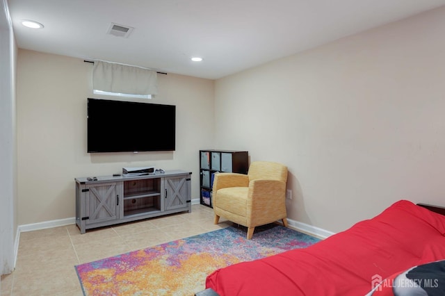 living area featuring recessed lighting, baseboards, visible vents, and light tile patterned floors