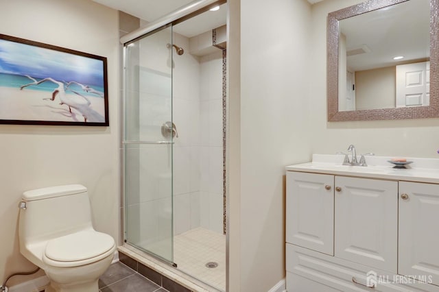bathroom with tile patterned flooring, a shower stall, vanity, toilet, and recessed lighting