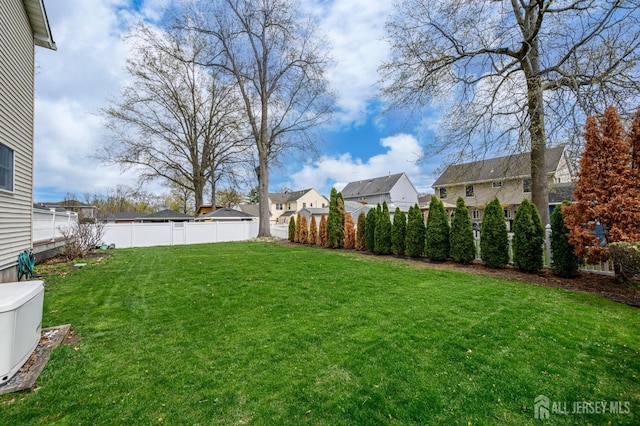 view of yard featuring a residential view