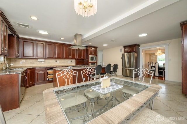 living room with light tile patterned floors, recessed lighting, and a chandelier