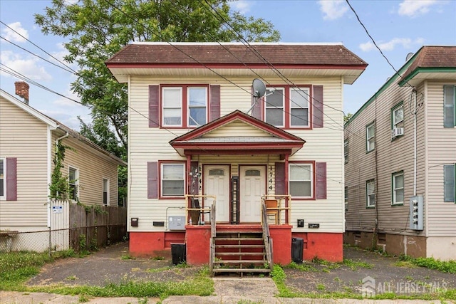 view of front of house featuring central AC unit