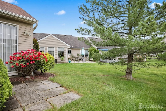 639 Madison Dr Unit C, Monroe, NJ 08831 - view of grassy yard with a patio