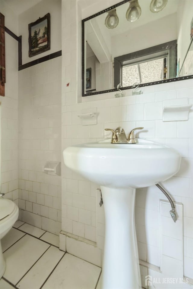 17 New Brunswick Ave, Matawan, NJ 07747 - bathroom with tile walls and tile patterned floors