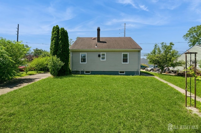 17 New Brunswick Ave, Matawan, NJ 07747 - rear view of property with a lawn