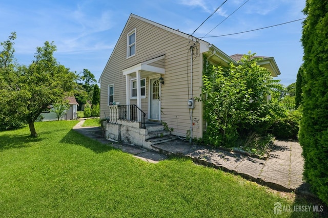 17 New Brunswick Ave, Matawan, NJ 07747 - back of property featuring a lawn
