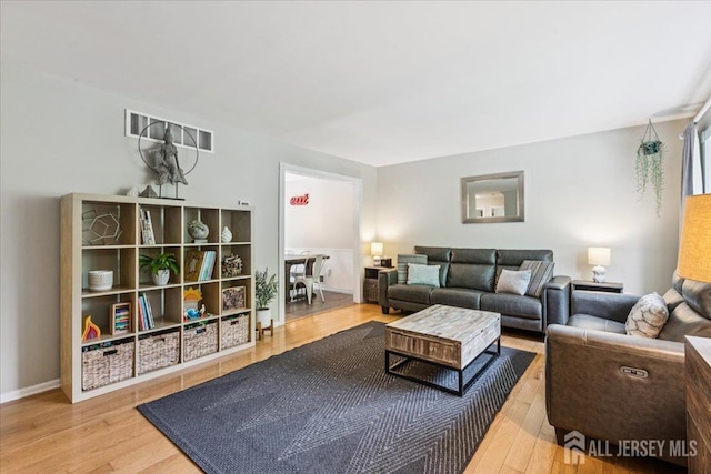 383 S Stump Tavern Rd S, Jackson, NJ 08527 - living room with wood finished floors and baseboards