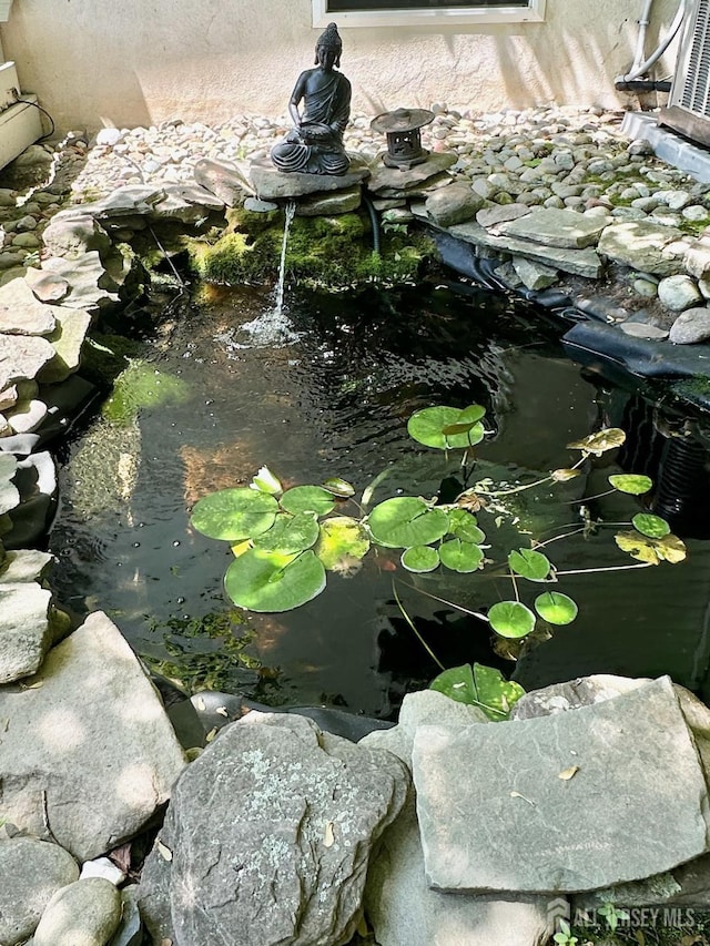 383 S Stump Tavern Rd S, Jackson, NJ 08527 - exterior view of a garden pond