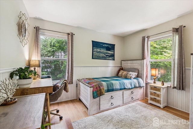 383 S Stump Tavern Rd S, Jackson, NJ 08527 - bedroom with a wainscoted wall and light wood-type flooring