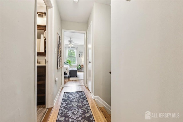 383 S Stump Tavern Rd S, Jackson, NJ 08527 - corridor featuring light wood-style flooring and baseboards