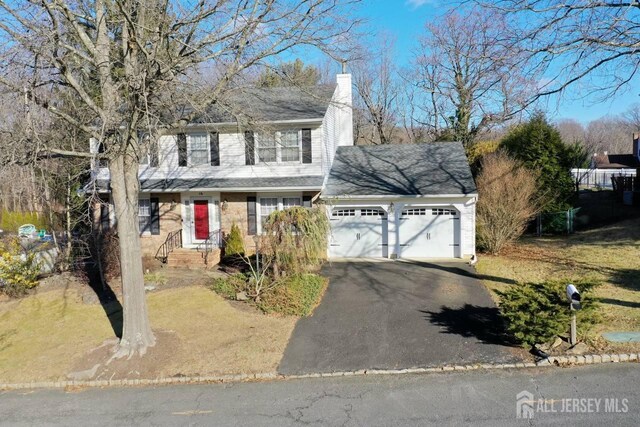 view of front property with a garage