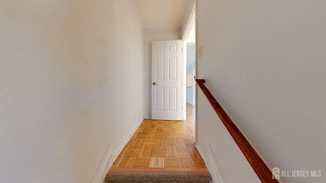 stairway with parquet floors