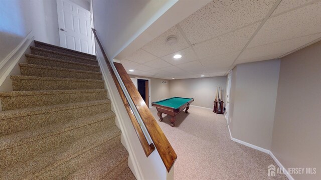 game room featuring pool table, a drop ceiling, and carpet flooring