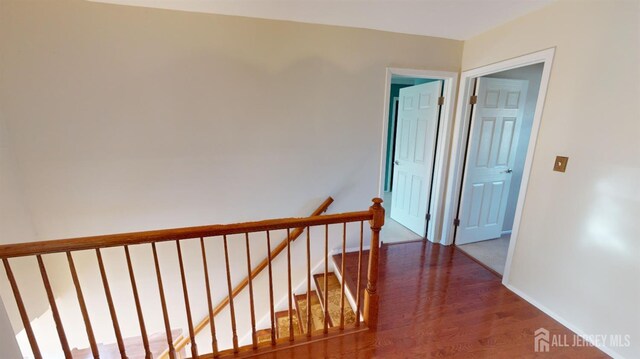 hall featuring dark hardwood / wood-style floors