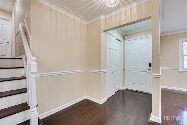 4 Adelphi Ct, Edison, NJ 08837 - entrance foyer featuring dark wood-style flooring, stairs, baseboards, and ornamental molding