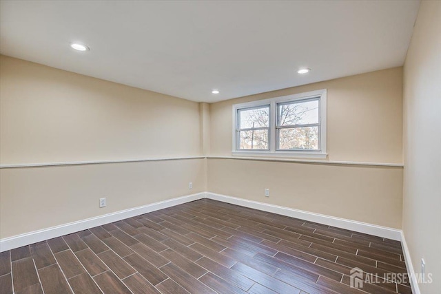 unfurnished room featuring recessed lighting, baseboards, and wood tiled floor