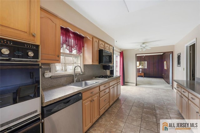 kitchen with oven, a sink, stainless steel dishwasher, tasteful backsplash, and black microwave