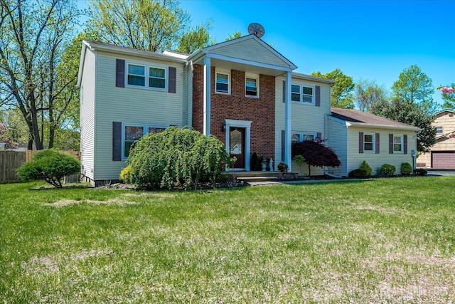 neoclassical home with a front yard and fence