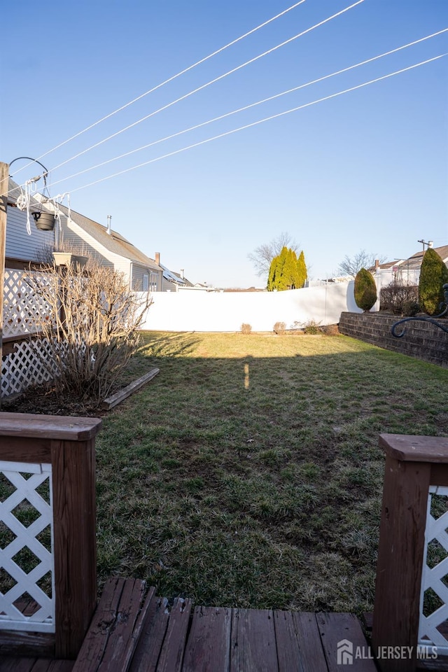 view of yard with fence