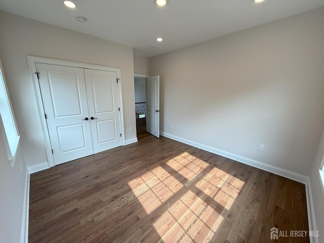 2 Joye Ln, South Brunswick, NJ 08852 - unfurnished bedroom with wood finished floors, recessed lighting, and a closet