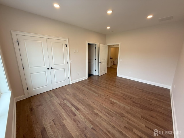 2 Joye Ln, South Brunswick, NJ 08852 - unfurnished bedroom with wood finished floors, recessed lighting, and a closet