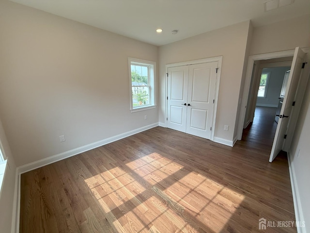 2 Joye Ln, South Brunswick, NJ 08852 - unfurnished bedroom with wood finished floors, recessed lighting, and a closet