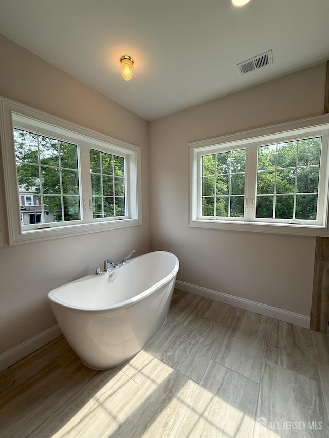2 Joye Ln, South Brunswick, NJ 08852 - full bathroom with a freestanding bath and healthy amount of natural light