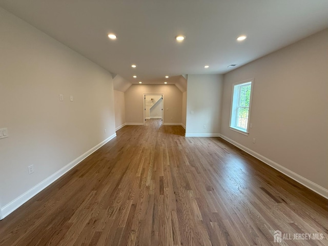 2 Joye Ln, South Brunswick, NJ 08852 - spare room with recessed lighting, dark wood-type flooring, and vaulted ceiling