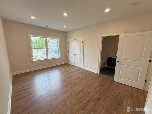 2 Joye Ln, South Brunswick, NJ 08852 - unfurnished bedroom featuring wood finished floors, recessed lighting, and ensuite bath