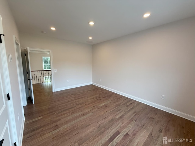 2 Joye Ln, South Brunswick, NJ 08852 - spare room with dark wood finished floors and recessed lighting