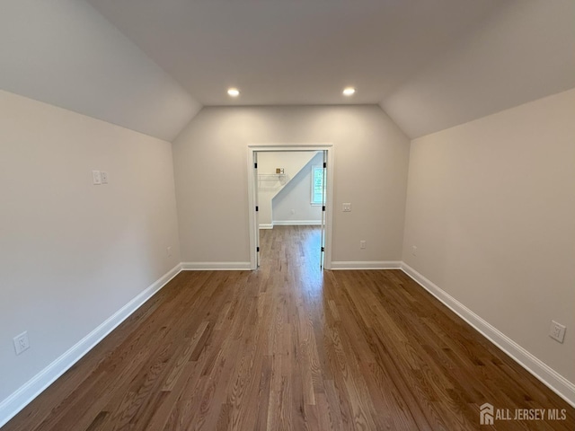 2 Joye Ln, South Brunswick, NJ 08852 - bonus room with lofted ceiling and dark wood-style flooring