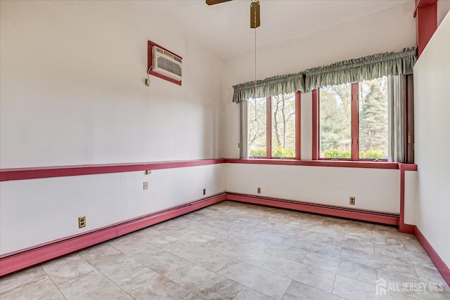 unfurnished room featuring baseboards, a ceiling fan, and a baseboard radiator