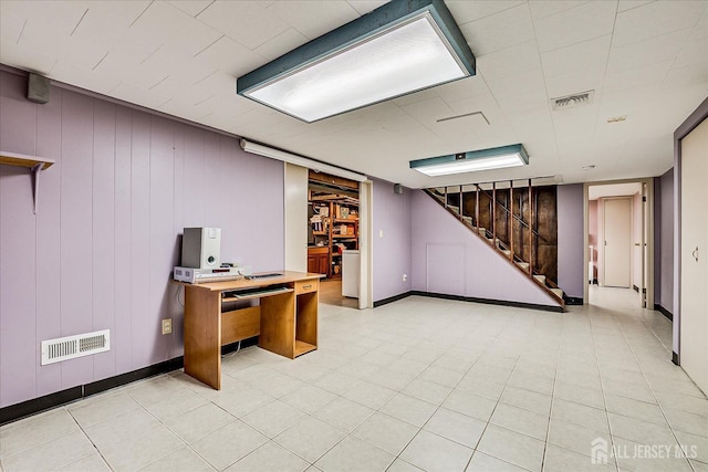 unfurnished office featuring baseboards and visible vents