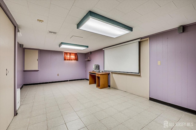 cinema room featuring baseboards and visible vents