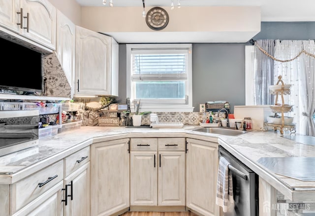 24 Higgins Rd, Old Bridge, NJ 08857 - kitchen featuring stainless steel dishwasher, a sink, and light countertops